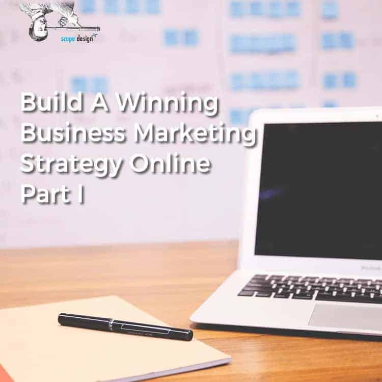 Laptop and notepad on desk for business strategy.